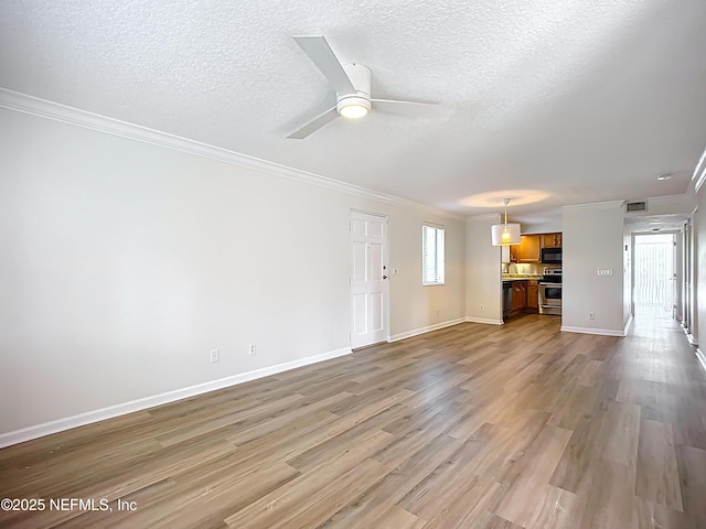 5375 Ortega Farms Blvd Unit 614, Jacksonville, FL 32210 - unfurnished living room with ornamental molding, wood finished floors, a textured ceiling, a ceiling fan, and baseboards