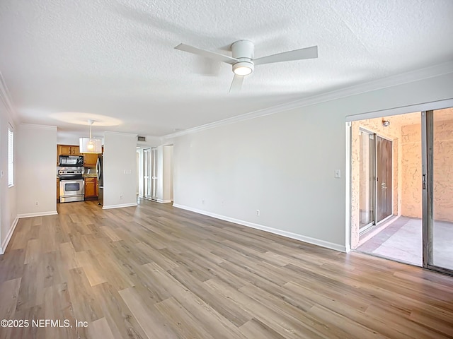 5375 Ortega Farms Blvd Unit 614, Jacksonville, FL 32210 - unfurnished living room with ornamental molding, a textured ceiling, light wood-type flooring, ceiling fan, and baseboards