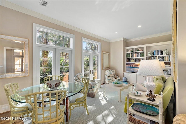 sunroom / solarium with french doors and visible vents