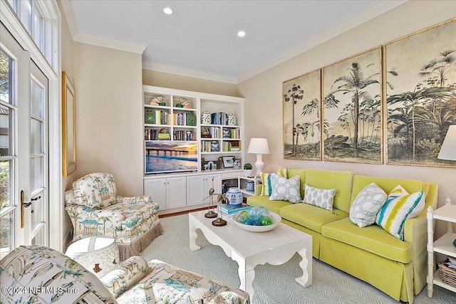 living room with crown molding and recessed lighting