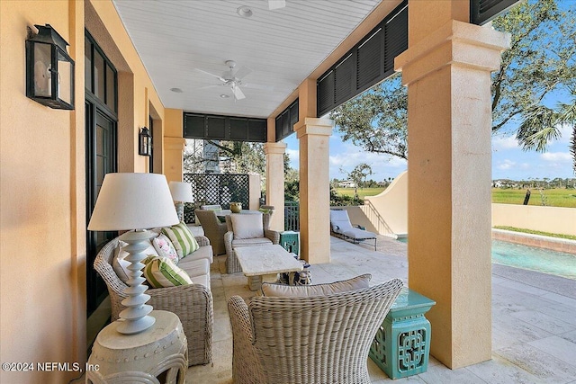 view of patio / terrace featuring an outdoor hangout area and a ceiling fan