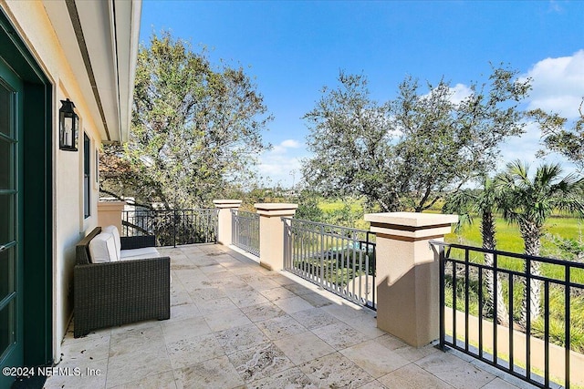 view of patio / terrace featuring a balcony