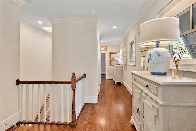 hallway with recessed lighting, baseboards, dark wood-type flooring, and crown molding