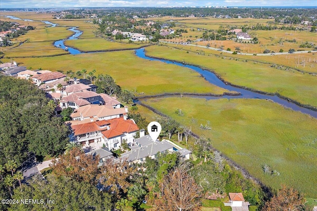 bird's eye view with a residential view and a water view