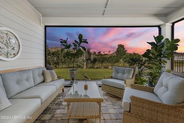 patio terrace at dusk with an outdoor hangout area