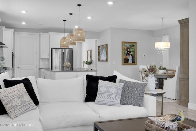 living room with light hardwood / wood-style floors