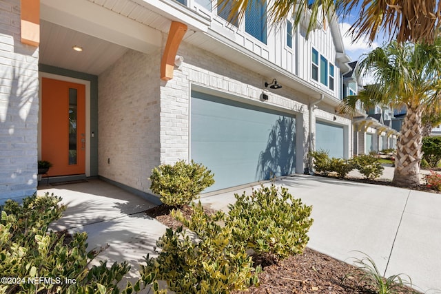 property entrance with a garage