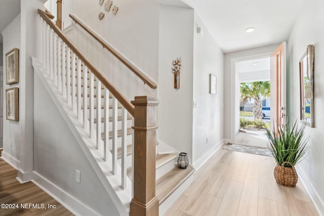 foyer entrance with light wood-type flooring