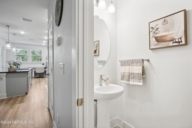 bathroom featuring sink and hardwood / wood-style flooring