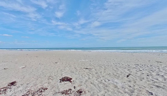 property view of water featuring a view of the beach