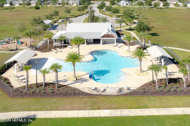 view of swimming pool with a patio area