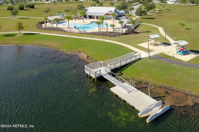 birds eye view of property featuring a water view