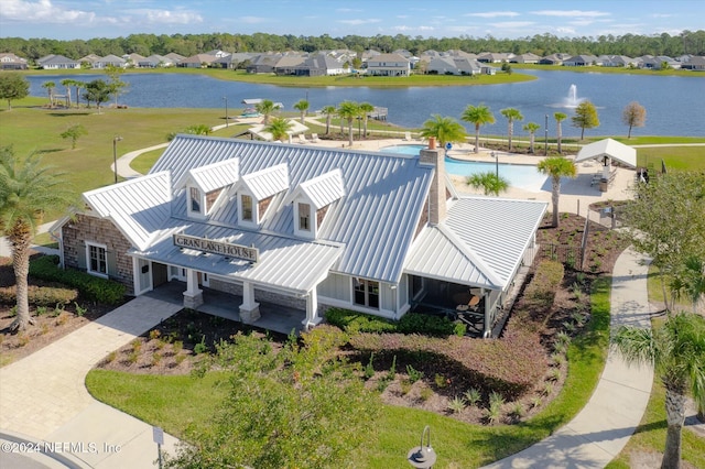 drone / aerial view with a water view