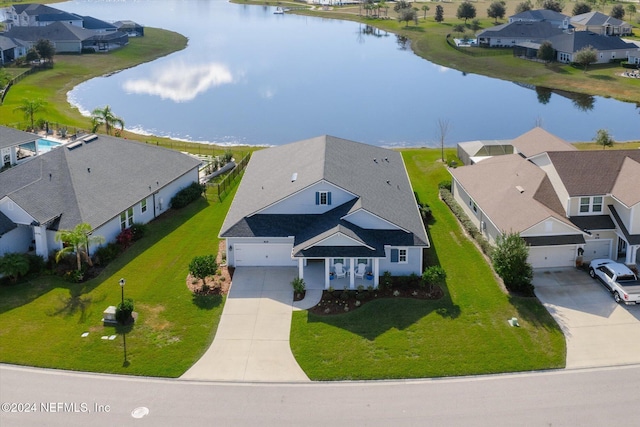 drone / aerial view featuring a water view