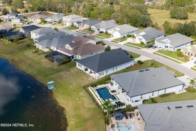 drone / aerial view with a water view