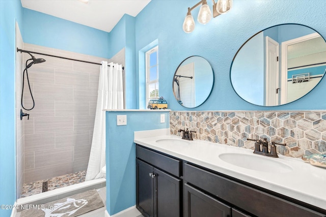 bathroom featuring a shower with curtain, toilet, vanity, and tasteful backsplash