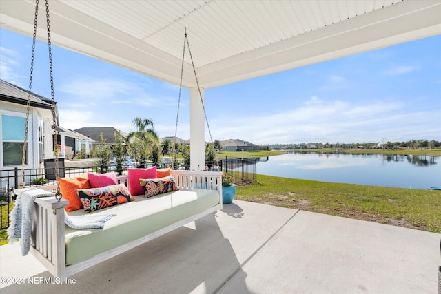 view of patio / terrace with a water view and an outdoor hangout area