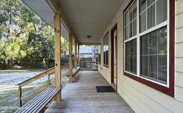 wooden deck featuring a porch