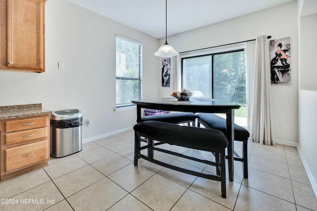 view of tiled dining space