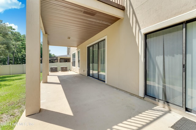 view of patio with central AC unit