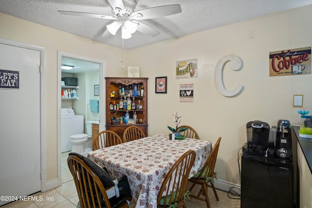 2975 SW Sunset Trace Cir Unit 2975, Palm City, FL 34990 - tiled dining room with ceiling fan, a textured ceiling, and washer / dryer