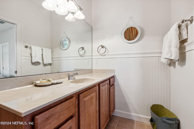 bathroom featuring tile patterned floors and vanity