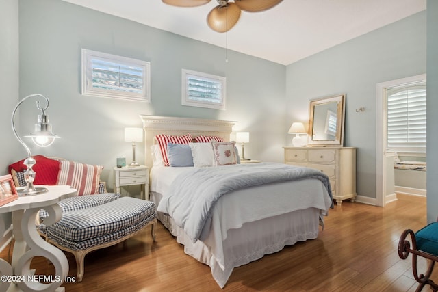 bedroom featuring hardwood / wood-style flooring and ceiling fan