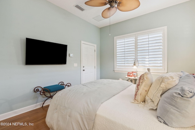 bedroom featuring hardwood / wood-style flooring and ceiling fan