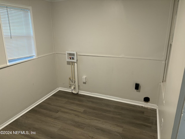 clothes washing area featuring washer hookup and dark wood-type flooring