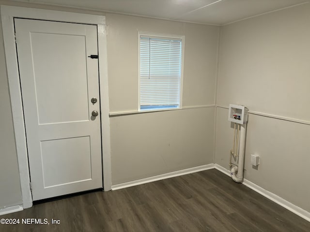 doorway to outside with dark wood-type flooring