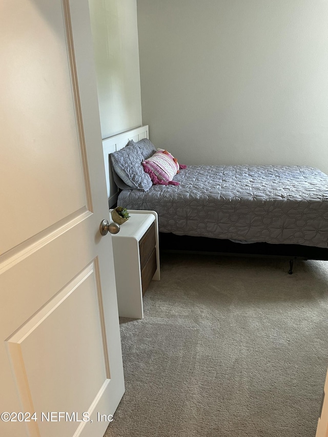 unfurnished bedroom featuring carpet