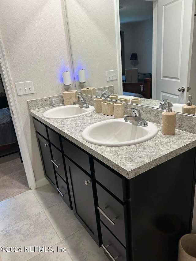 bathroom featuring vanity and tile patterned floors