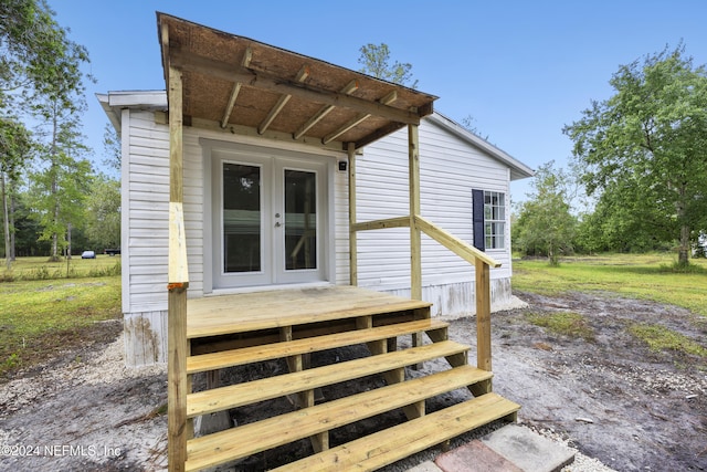 entrance to property featuring french doors