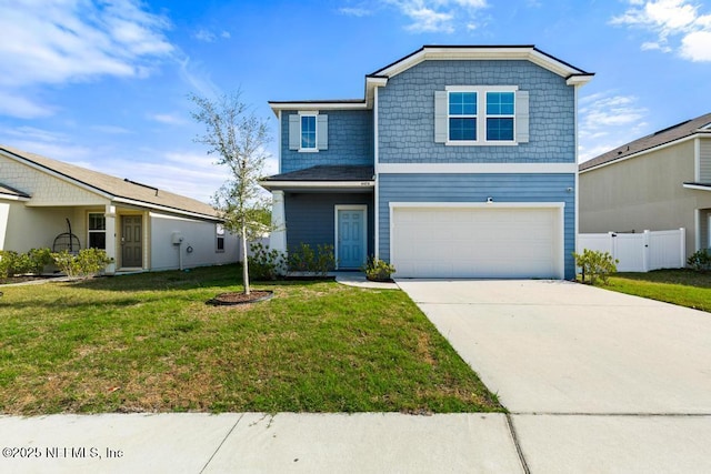 view of front facade featuring a garage and a front yard