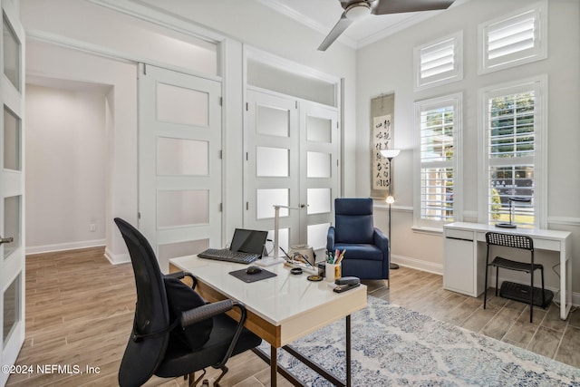 office area featuring ceiling fan and ornamental molding