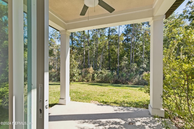 view of patio featuring ceiling fan