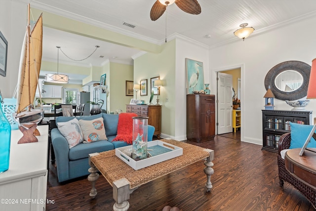 living room with crown molding, ceiling fan, and dark hardwood / wood-style floors