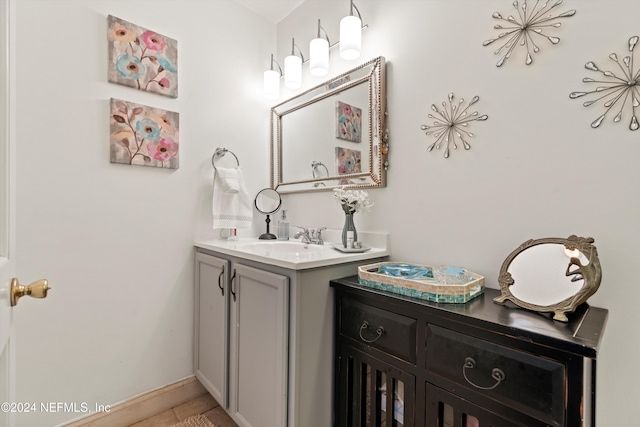 bathroom featuring vanity and tile patterned flooring