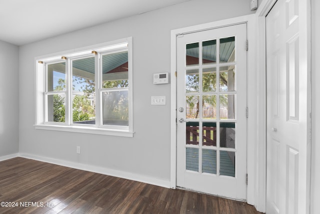 doorway to outside with dark hardwood / wood-style flooring