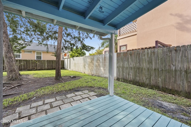 deck featuring a lawn