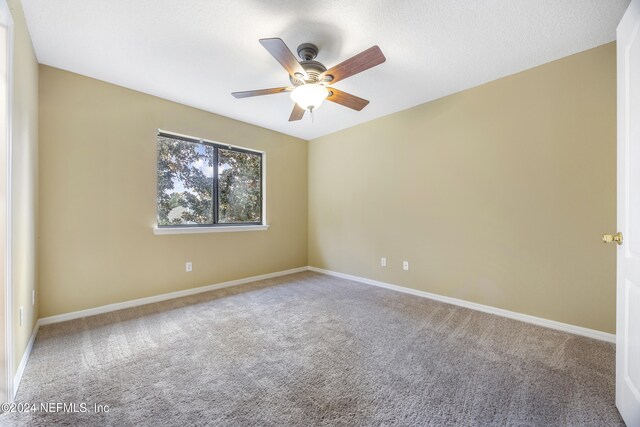 532 Dry Branch Way, Saint Johns, FL 32259 - spare room with a ceiling fan and carpet floors