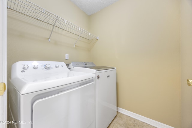 532 Dry Branch Way, Saint Johns, FL 32259 - laundry area with separate washer and dryer and light tile patterned floors