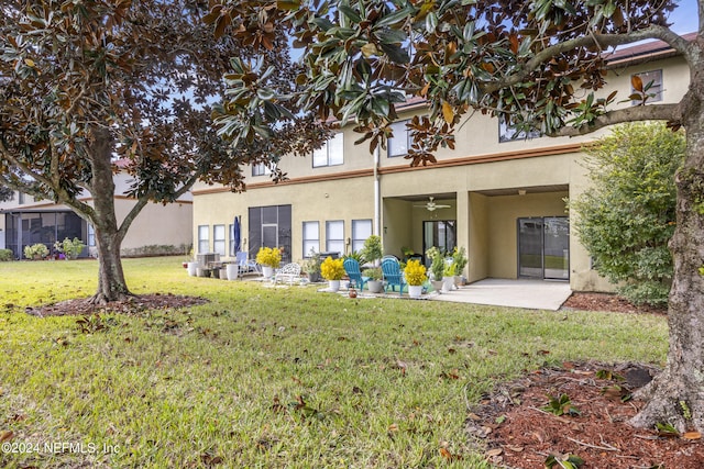 532 Dry Branch Way, Saint Johns, FL 32259 - rear view of property with stucco siding, ceiling fan, a yard, and a patio
