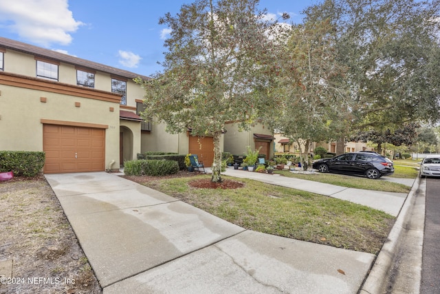 532 Dry Branch Way, Saint Johns, FL 32259 - multi unit property featuring driveway, stucco siding, and a garage