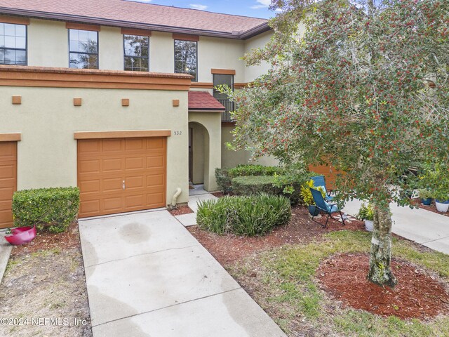 532 Dry Branch Way, Saint Johns, FL 32259 - view of front of property featuring concrete driveway, stucco siding, an attached garage, and a shingled roof