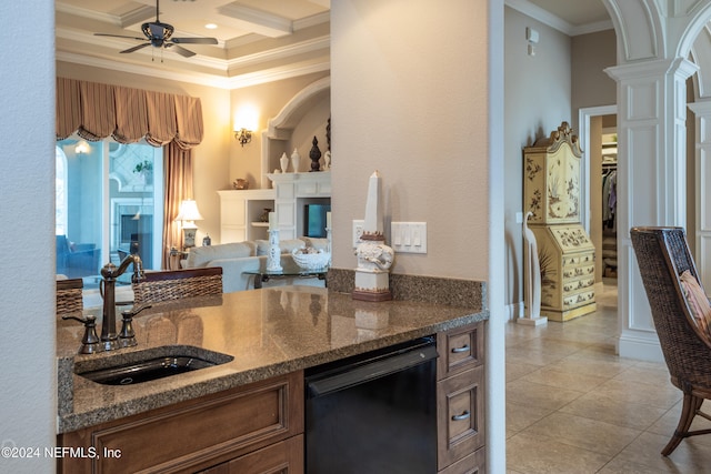 kitchen with dishwasher, coffered ceiling, sink, ornamental molding, and beam ceiling