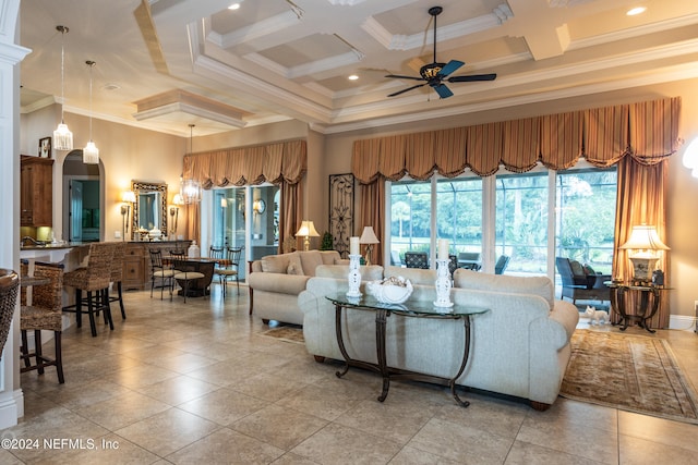 living room with beam ceiling, ceiling fan, crown molding, and coffered ceiling