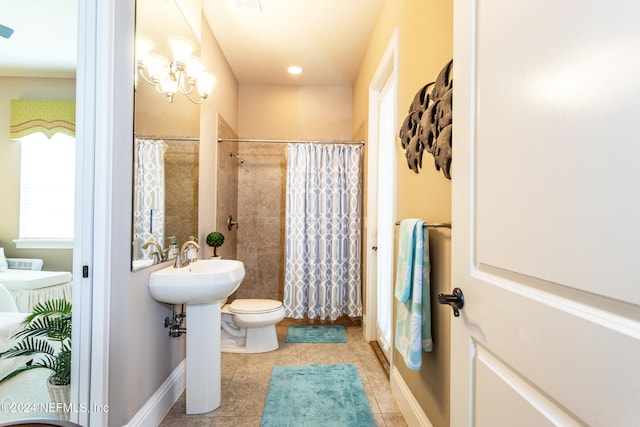 bathroom with tile patterned floors, toilet, and a shower with shower curtain