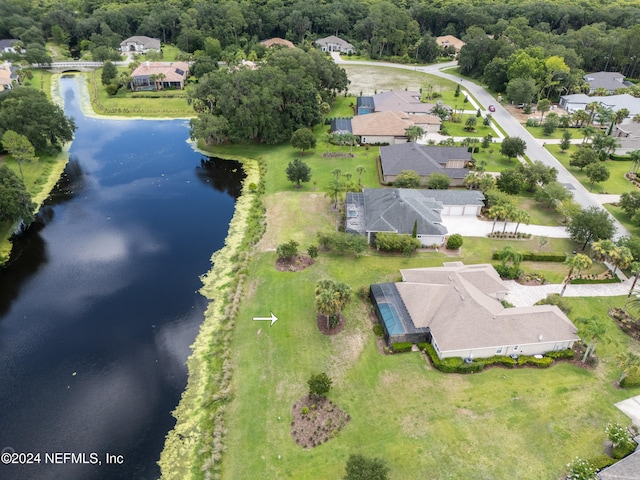 drone / aerial view featuring a water view