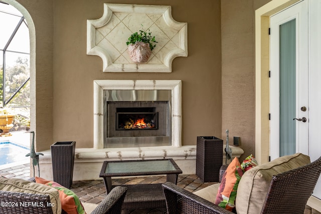 view of patio featuring an outdoor fireplace